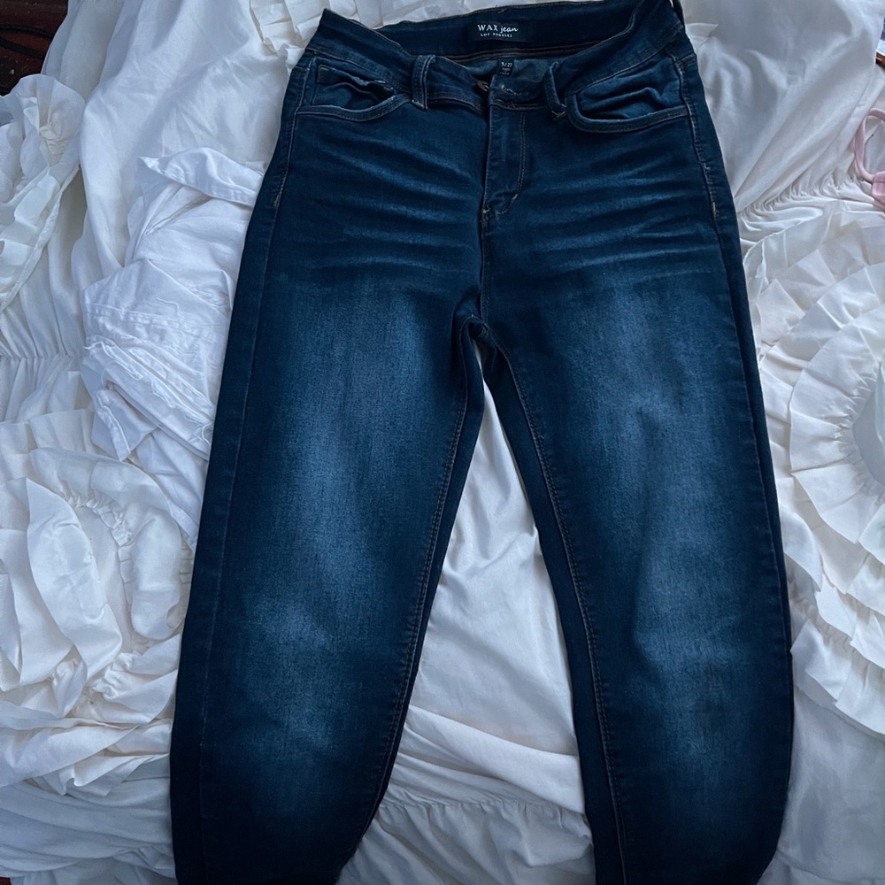 Skinny dark denim jeans for sale and size 27.